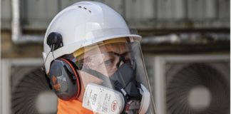 Hard-hat mounted cough guard will help protect site workers